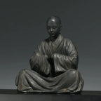 Sitting Buddhist Monk